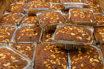 Kolkata, West Bengal, India - 29th Dcemeber 2019 : Plain plum Cakes are being sold at Nahoum and Sons, New Market area. Very famous and more than 100 years old cake shop, heritage of Kolkata.