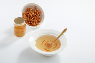 Front view of white bowl of cooked birdnest in white background healthcare food 