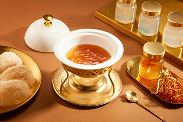 Front view of birdnest bowl with goji berry with cordycep in wooden table background  