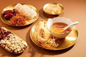 Front view of birdnest bowl with goji berry with cordycep in wooden table background  