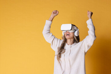 Interactive virtual reality goggles.Asian teen woman wearing VR or Virtual Reality head set for...