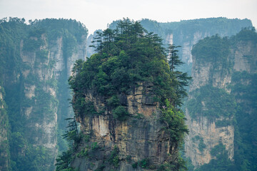 Fototapeta na wymiar Dark toning of the top of limestone Avatar Hallelujah mountain in Wulingyuan National Forest Park, Zhangjiajie, Hunan, China, copy space for text, wallpaper, background