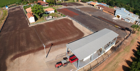 Drone view of the yard for drying freshly harvested coffee beans from a farm in Brazil