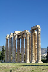 Ancient columns with lintels in a park in Athens, Greece