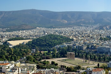 Overhead view of Athens, Greece, with a park with ancient columns in the center