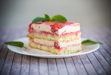 strawberry poppy cake with cream in a plate