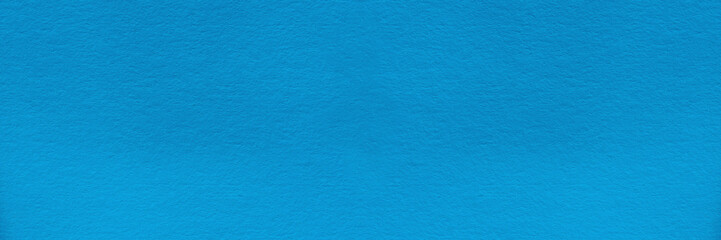 Naklejka na ściany i meble Background Texture of blue cardboard. Blue textured paper background for the design. Macro photography of the surface of thick blue paper