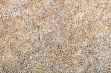 Granite brown surface texture, abstract pattern in beige tones.
