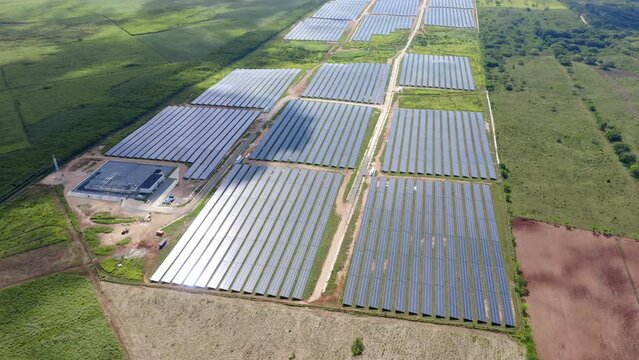 Vast Solar Panels Power Plant On Parque Fotovoltaico El Soco In San Pedro de Macor&iacute;s, Dominican Republic. Aerial Drone Shot