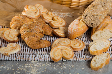 Fototapeta na wymiar Image of various kinds of bread and bakery products on table