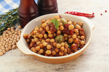 Chickpea beans with dry tomato and olives