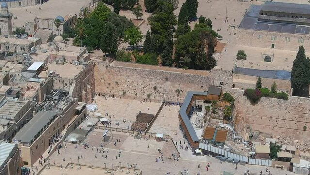 Western wall and golden dome of the rock mosque, aerial view
Drone and unique shot from Jerusalem in summer of 2022, the Kotel and al Aqsa mosque, israel


