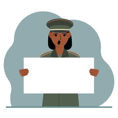 A military man in uniform holds a white sheet of paper in his hands. Concept for advertising, poster, banner.