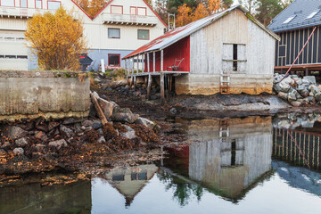 Fototapeta na wymiar Norwegian fishing village view with wooden barns