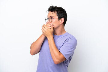 Young man with moustache isolated on white background covering mouth and looking to the side