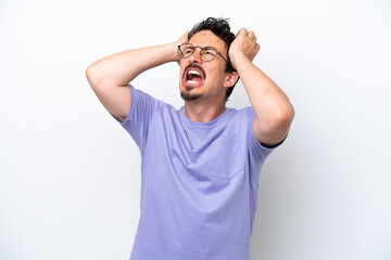 Fototapeta premium Young man with moustache isolated on white background stressed overwhelmed