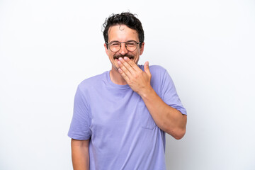 Young man with moustache isolated on white background happy and smiling covering mouth with hand