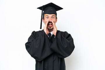 Young university graduate man isolated on white background shouting and announcing something