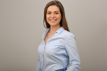 Smiling caucasian woman in blue shirt. isolated business portrait.