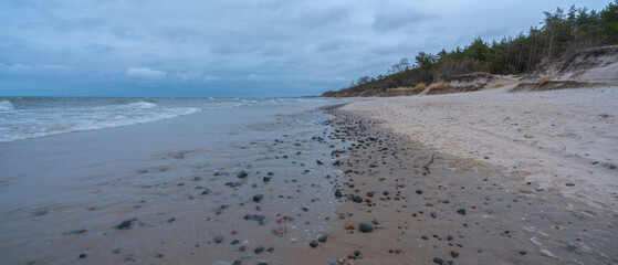 shore of the baltic sea on a cloudy day in autumn