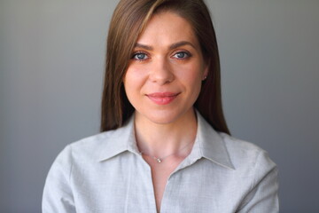 Fototapeta premium Close up face portrait of young woman. Isolated female portrait.