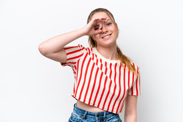 Young caucasian girl isolated on white background showing ok sign with fingers