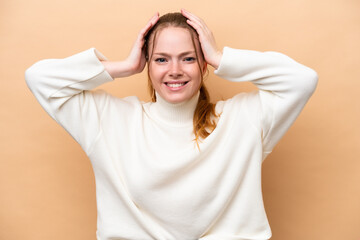 Young caucasian woman isolated on beige background doing nervous gesture