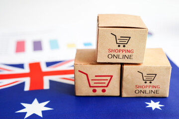 Online shopping, Shopping cart box on USA Australia flag, import export, finance commerce.