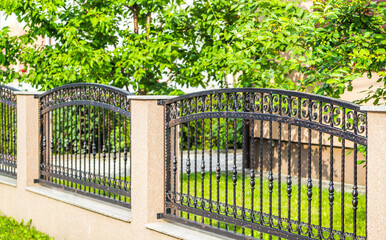 Black Wrought Fence. Iron fence
