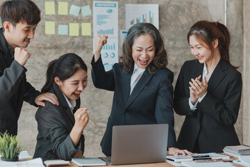Senior businesswoman, senior management and team showing joy together, she is meeting with department head staff at the conference room, senior female executives and young staff working together.