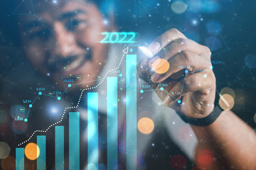 2022 business concept, businessman or engineer Show the trend of driving modern innovations to develop more efficient technology.