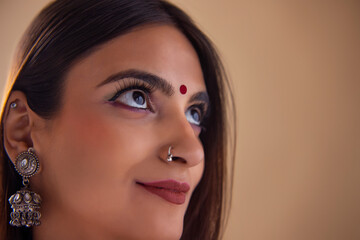 Close-up portrait of a cheerful young woman
