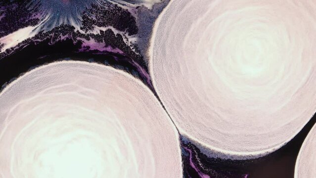 White paint creating abstract cosmic video art background. Fluid art drawing, abstract texture with colorful waves.
