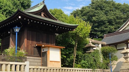 The green roof traditional shrine house of Japan, “Gojyoten Jinjya”, clear blue sky June 10th year 2022