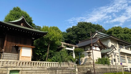 The overall house of Japanese shrine facade, “Gojyoten Jinjya” in Ueno park year 2022 June 10th sunny weekday