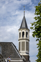 Fototapeta premium The Onze Lieve Vrouw ten Hemelopneming with white tower, better known as Elleboogkerk, was built in 1783 for one of the four Catholic stations. Amersfoort, the Netherlands.