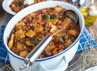 Healthy family meal with a ground beef stew. Cooked with cabbage, vegetables and kidney beans