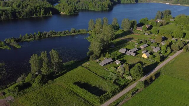 AERIAL Orbiting Shot of a Small Settlement in Rural Lithuania