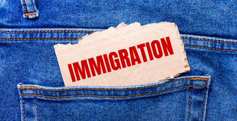 In the back pocket of the jeans there is a brown piece of paper with the text IMMIGRATION