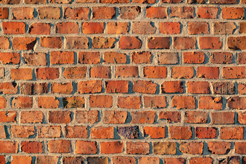 Red brick wall background, a beautiful architectural texture of an old clinker wall of an historic...