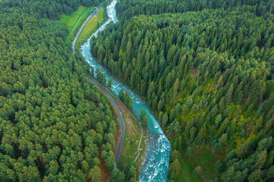 Aerial view of a river crossing a forest near Pahalgam, Jammu and Kashmir, India.
