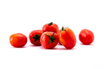 Healty fruit. Tomatoes on the white background.