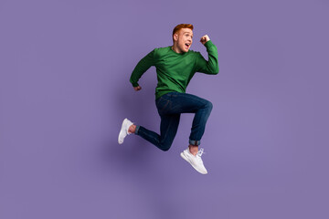 Fototapeta na wymiar Full size profile side photo of young man runner jumper rush fast discount isolated over violet color background