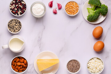 Products rich in calcium on dark background.