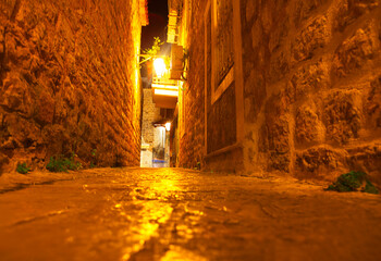 Illuminated narrow street