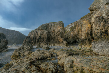 The Peninsula of Howth Head on a foggy day, the cliffs warped by fog, Dublin, Seashore of  cliffs, bays and rocks landscape, dangerouse cliffs, spectacular views in Ireland , Ireland