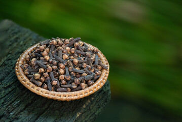 Dried clove flowers on nature background