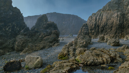 The Peninsula of Howth Head on a foggy day, the cliffs warped by fog, Dublin, Seashore of  cliffs, bays and rocks landscape, dangerouse cliffs, spectacular views in Ireland , Ireland