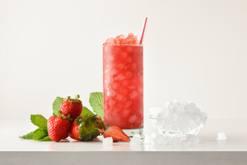 Strawberry slush drink with fruit and ice and isolated background