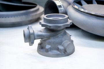 Model object of a large industrial part printed on a 3D printer from metal close-up. New modern...